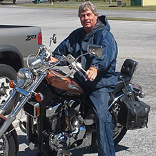 man on a motrorcycle with an all-weather jacket