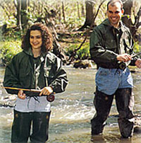 couple fishing in waterproof wader jackets